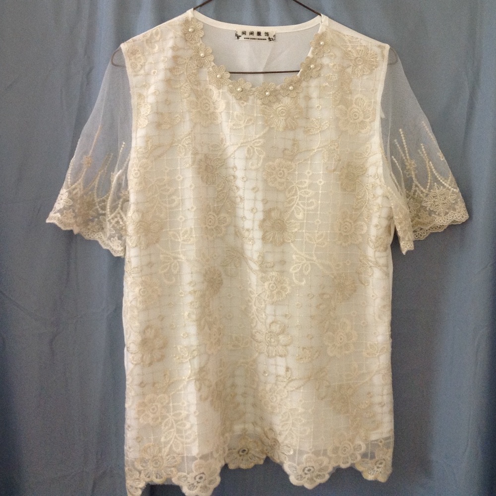 Stunning XIAN XIAN cream embroidered blouse